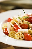 Wagon Wheel Pasta with Tomatoes and Parmesan Cheese
