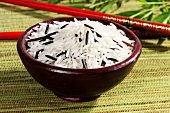 Basmati rice and wild rice in ceramic bowl