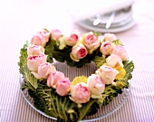 Heart shaped made of rose heads and cabbage leaves