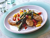 Turkey medallions with pineapple, green onions and peppers
