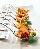 Lentil salad with chicken morsels served on spoons