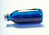 "Shuuut" Relaxing-Badeöl in blauer Flasche