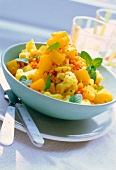 Saffron potatoes with cauliflower in bowl