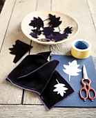 Tree shaped leaves cut out from scroll velvet for wreath