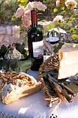 Nut bread with cheese served with wine in garden