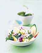 Noodle arugula salad with coriander pears in bowl