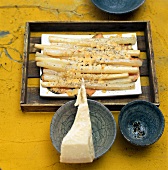 Close-up of grated salsify on square plate
