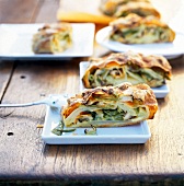 Vegetable strudel with chives on small plates