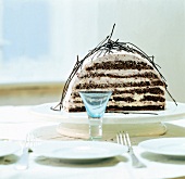 Chocolate mascarpone pie on white cake stand