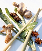 Close-up of Asian ingredients, ginger, lemon grass, lime leaves and star anise