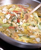 Close-up of Thai chicken curry in a pan