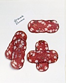 Tuscan salami on white background