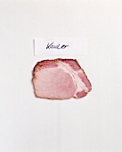 Slice of Kassler pork on white background