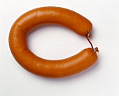 Close-up of pork sausage on white background