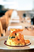 Close-up of rock shrimp with wasabi mashed potato and spinach miso on plate