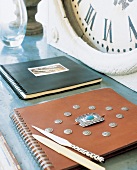 Spiral notebook, ring binders and letter opener in ethnic style
