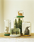 Various Christmas decorations in tinkered jars