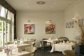 Restaurant im Hotel Ostende in Ahlbeck auf Usedom innen Tische