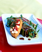 Mediterranean vegetable jelly with sardines on rectangular plate