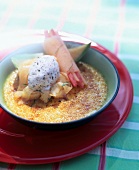 Close-up of stracciatella ice-cream with burnt wine cream in bowl