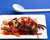 Roasted lobster with salsify on square plate