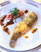 Close-up of rao fish with tatar sauce on plate