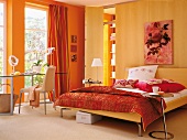 View of bedroom with yellow wall and oranges curtains