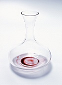 Close-up of decanter carafe on white background