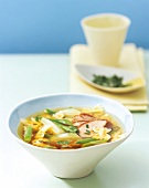 Noodle soup with pork in bowl