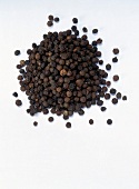 Malabar peppercorns on white background