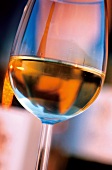 Close-up of wine glass with white wine