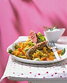 Couscous with fillet of lamb and vegetable on plate