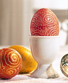 Close-up of painted Easter egg in egg cup