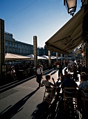 People relaxing at Place des Terreaux square in Lyon, France