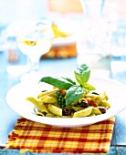Penne pasta with vegetable on plate