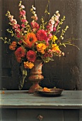 Bouquet of summer flowers in vase on table