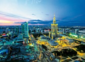 View of metropolis and skyline at night in Warsaw