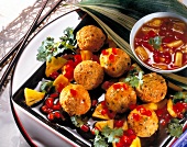 Chicken meatballs with soy sauce and coriander on plate, Euro-Asian cuisine