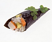 Sushi bags with rice crab stick and avocado in yaki-nori sheets, white background