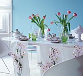 Coffee table with tableware for Easter decorations