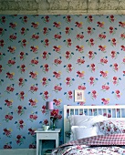 Bedroom with floral pattern wallpaper