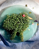 Green Chick in cress on green plate for Easter