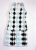 Diamond patterned mini dress on white background