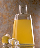 Lemon liqueur made of lemon, limes and cloves in glass bottle