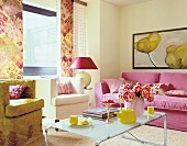 View of living room with pink sofa