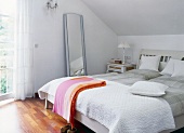 Bedroom with white double bed