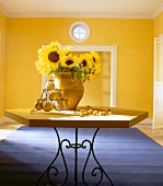 Sunflowers in vase on table