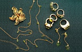 Various golden jewellery, overhead view