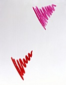 Two zigzag line of red and pink lipstick on white background