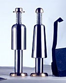Close-up of pepper shaker and salt shaker made of stainless steel